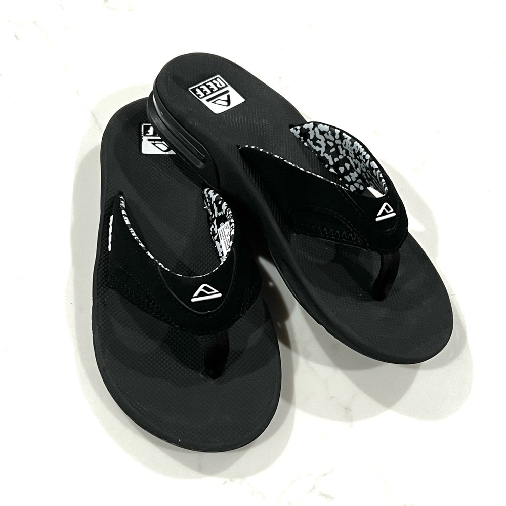 Reef Fanning Women’s bottle opener flip-flops